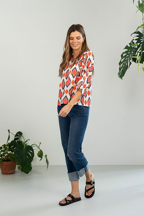Blusa fluida de estampado geométrico con manga murciélago