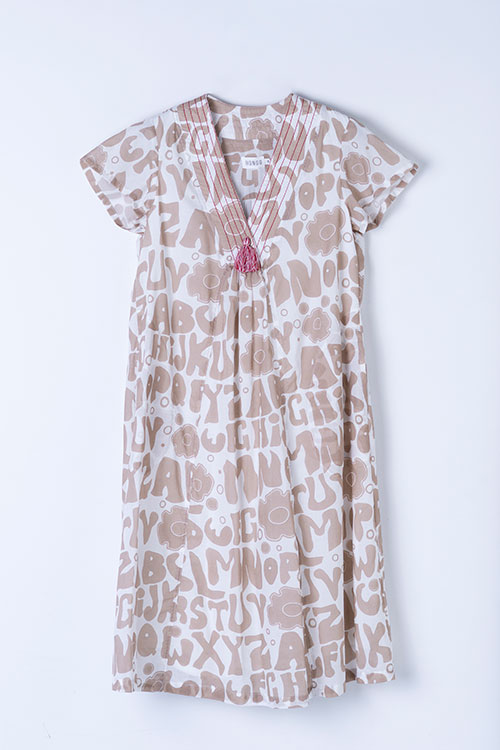 Vestido midi de algodón con escote en pico y borla decorativa