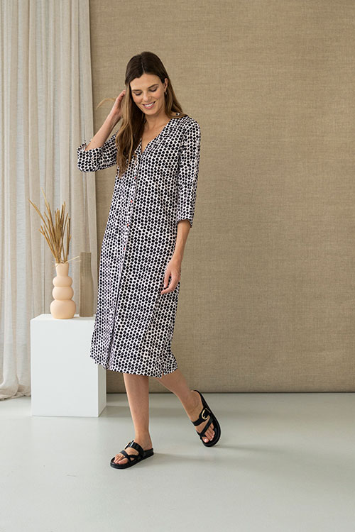 Vestido camisero de punto con estampado de lunares