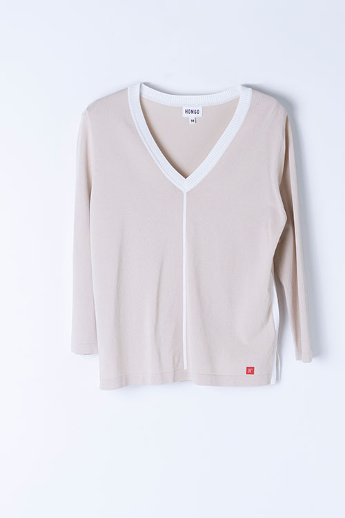 Jersey de punto fino beige con contraste en crudo